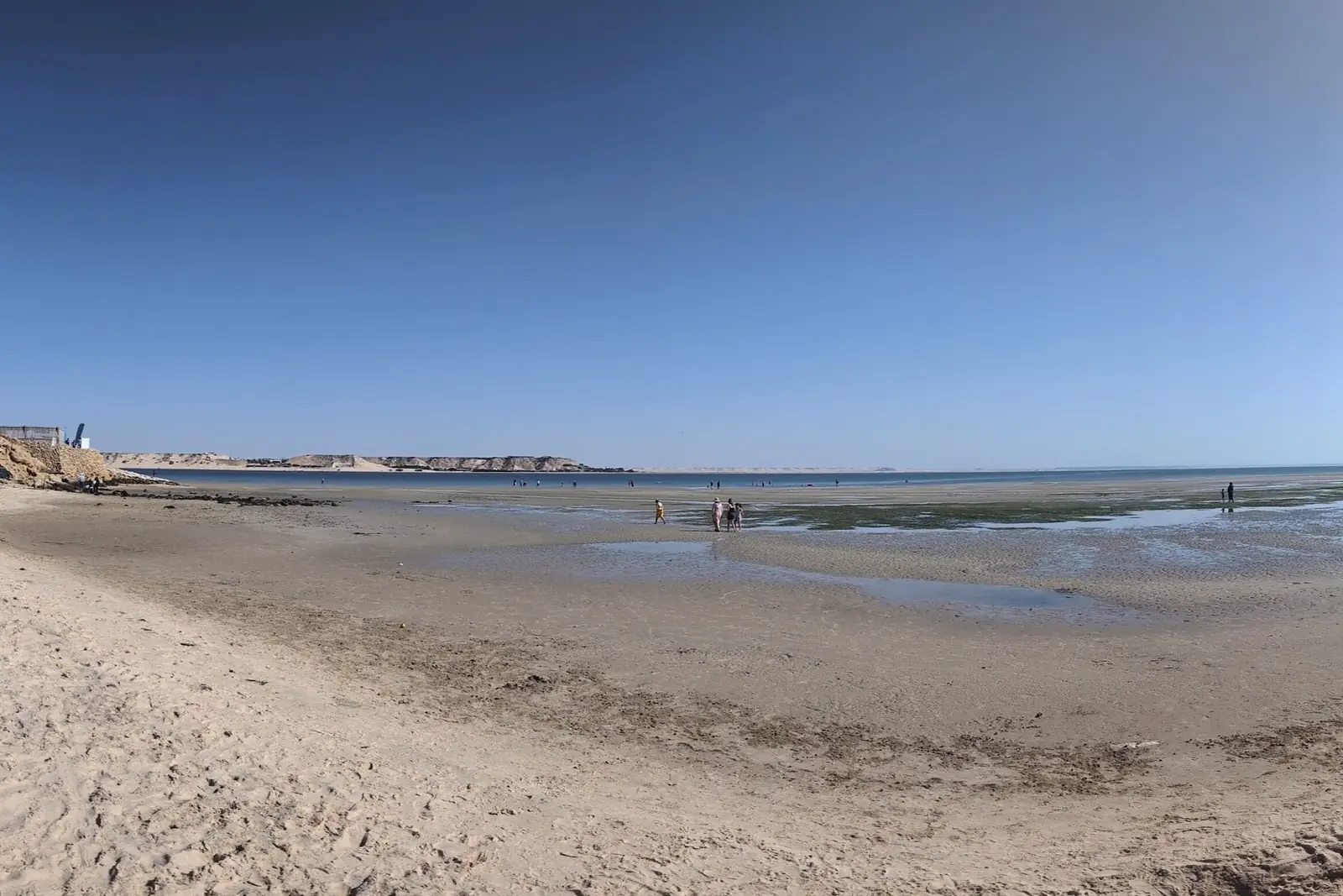 Wide sandy beach at PK25 on the Dakhla lagoon at low tide
